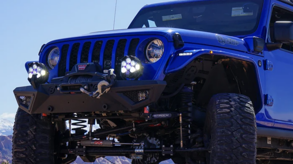 Jeep with Baja Designs auxiliary lights and off-road bumper