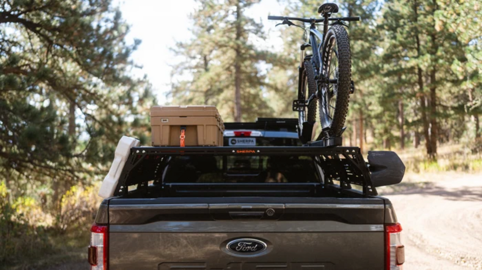 Truck bed rack carrying bike and cargo