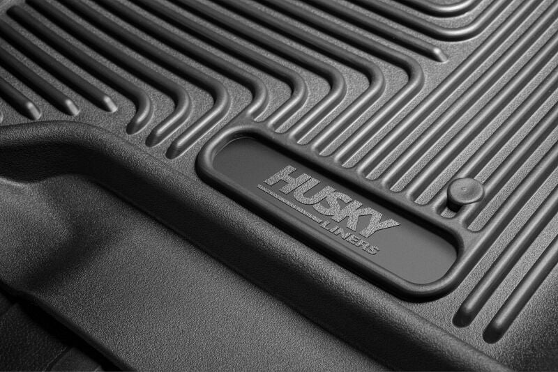 Close-up of the rugged FormFit design on a Husky Liners WeatherBeater floor mat.