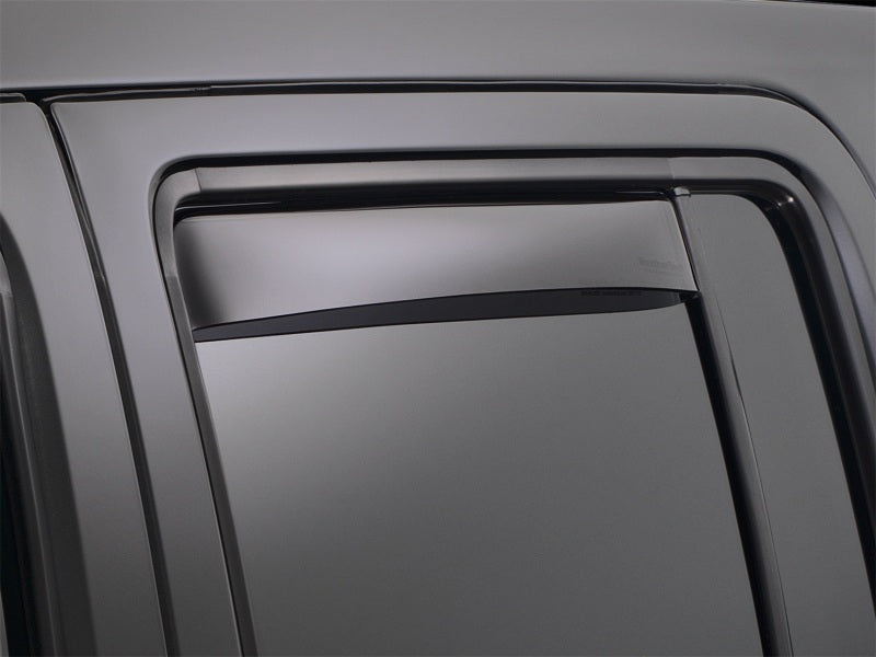 Low-profile AVS In-Channel window vents providing a perfect, seamless fit on a Toyota Tacoma. Shop the best prices and get fast shipping on all window deflectors at OffRoadUSA.