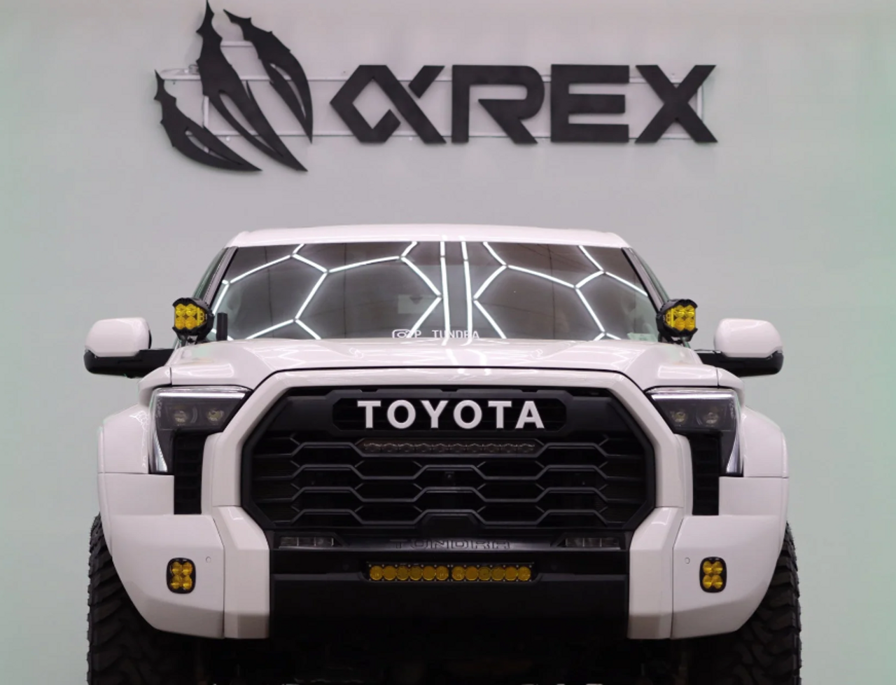 AlphaRex NOVA-Series LED headlights on an off-road truck, emphasizing brightness and advanced lighting technology for sales.