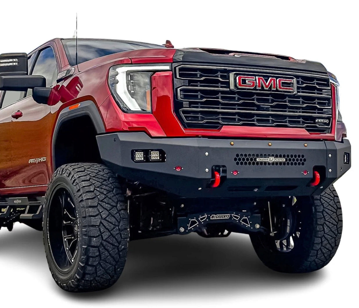 picture of a lifted red 2024+ GMC Sierra 2500/3500 FUEL SERIES FRONT BUMPER by Chassis Unlimited