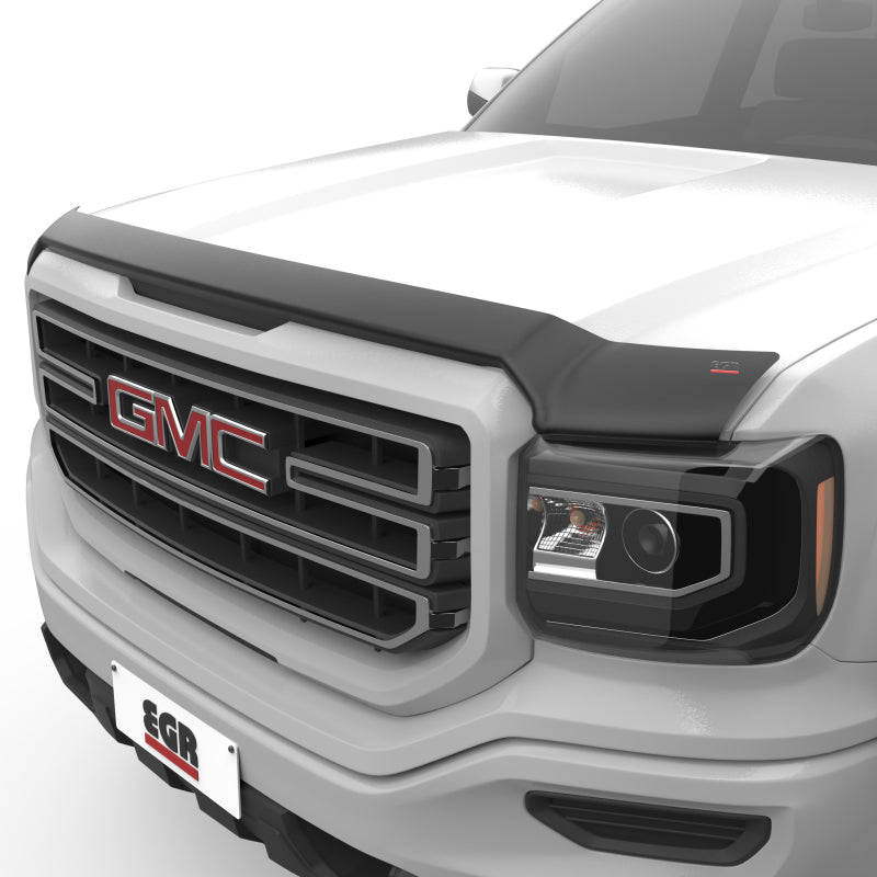 Dark smoke AVS bug deflector installed on a GMC Sierra 1500 for rock chip protection. Shop the best prices on GMC hood shields at OffRoadUSA.