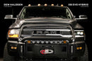 Black Ram truck with headlights on a black background, comparing OEM Halogen and XB EVO Hybrid lights.