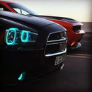 Close-up of black charger with cyan halos.