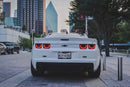 Rear end of a Chevrolet Camaro with Afterburner 2.0 Tail Light Halos installed.