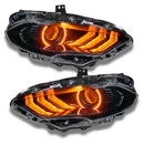 Ford Mustang headlights with amber halos and DRLs.