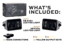 The Morimoto XB Evo fog lights for the Ford F-150 with packaging and included components on a white background
