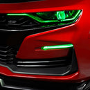 Close-up on a red Chevrolet Camaro with green fog light DRLs.