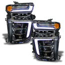 Chevrolet Silverado headlights with white DRLs.