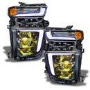 Chevrolet Silverado headlights with yellow demon eye projector.
