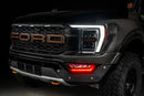 Front end of a Ford F-150 with red fog light DRLs