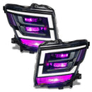 2021-2024 Nissan Titan headlights with pink demon eye projectors.