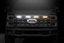 Front view of a 2023 Ford super duty truck with illuminated black Morimoto XBG LED DRL Grille against a dark background