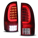 Winjet 2005-2015 Toyota Tacoma LED Tail Light w/Yellow Turn Signal Light - Chrome / Red