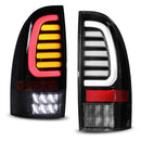 Winjet 2005-2015 Toyota Tacoma LED Sequential Tail Light w/Yellow Turn Signal - Glossy Black / Clear