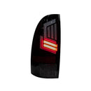 Winjet Toyota Tacoma 2005-15 Sequential Tail Lights - Glossy Black Clear