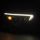 A photo of a white signal light in an AlphaRex 24-25 Toyota Tacoma / 25-up 4Runner NOVA-Series LED Projector Headlights Black