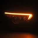 A picture of an amber signal light within an AlphaRex 24-25 Toyota Tacoma / 25-up 4Runner NOVA-Series LED Projector Headlights Black