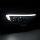 A photo of a white signal light in an AlphaRex 24+ Toyota Tacoma /25-up 4Runner OG-Style NOVA-Series LED Projector Headlights Black
