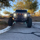 Front end of a Jeep Wrangler with amber LED Grill Light Kit installed.