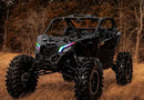Three quarters view of a Can-Am Maverick X3 with Dynamic ColorSHIFT DRLs.
