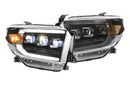 A pair of Morimoto XB LED headlights for a Toyota Tundra, featuring a triple-projector setup and LED DRL lights in a black housing.