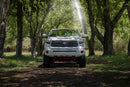 A photo of a 2021 Toyota Tundra with Amber Morimoto XB LED Headlights.