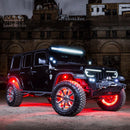 Three quarters view of a black Jeep with multiple ORACLE Lighting products installed.