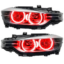 BMW 320 headlights with red LED halo rings.