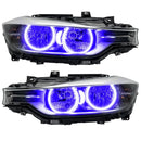 BMW 320 headlights with purple LED halo rings.