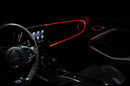 The dashboard of a car with ColorSHIFT Fiber Optic LED Interior Kit installed, glowing red.