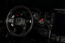 Drivers side seat of a RAM TRX with red LED ambient lighting.