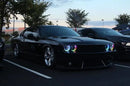 Black challenger with rainbow LED headlights
