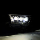 A picture of a lit AlphaRex 24+ Toyota Tacoma /25-up 4Runner OG-Style NOVA-Series LED Projector Headlights Black