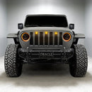 Front end of a Jeep with Oculus Headlights installed, with amber LED halos.