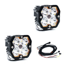 Two off-road LED lights (Baja Designs Squadron 2.0 Sport pods) with wiring harness on a white background