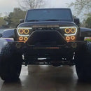 Front end of a Jeep Wrangler with Vector™ Series Grill LED Halo Kit installed.