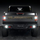 Rear view of a Jeep Gladiator with reverse lights on