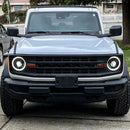 Front view of a white Ford Bronco with Oculus Headlights installed.