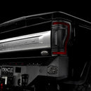 Close up on the rear end of a black Ford Superduty, with Flush Mount Tail Lights installed.
