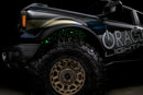 Low shot of fiber optic wheel liner kit installed with green LED lighting.