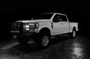 Three quarters view of a white Ford SuperDuty with LED Off-Road Side Mirrors installed.