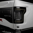 Close up of Tinted Flush Style LED Tail Lights installed on white Ford Raptor