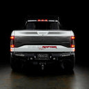 Rear view of white Ford Raptor with Flush Style LED Tail Lights installed and running lights turned on