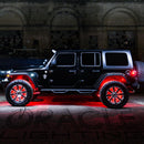 Side view of black Jeep with red LED lighting products.