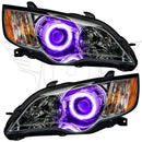 Subaru Legacy headlights with purple halos.