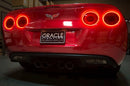 Rear view of C6 Corvette, with both sets of tail light halos glowing