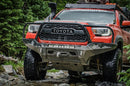 Red Toyota Tacoma offroading