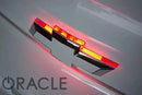 Close-up of Illuminated LED Rear Bowtie Emblem installed on a Chevrolet Camaro.
